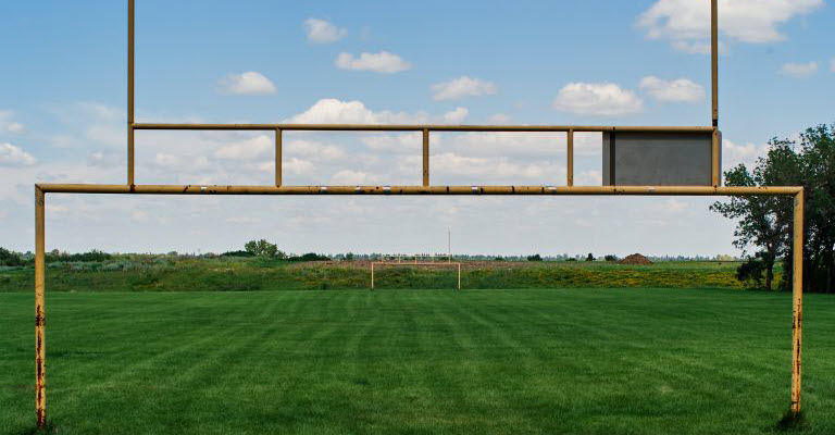 A set of football goalposts, suggesting that some valuations require a range of values